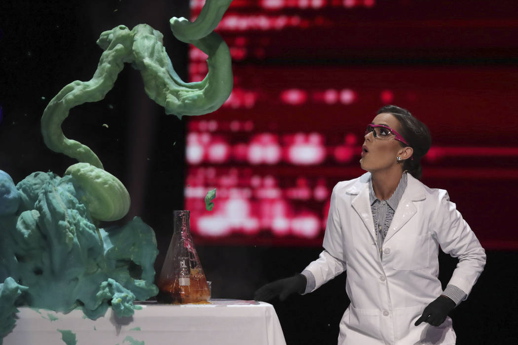 Camille Schrier, of Virginia, performs a science experiment prior to winning the Miss America c ...