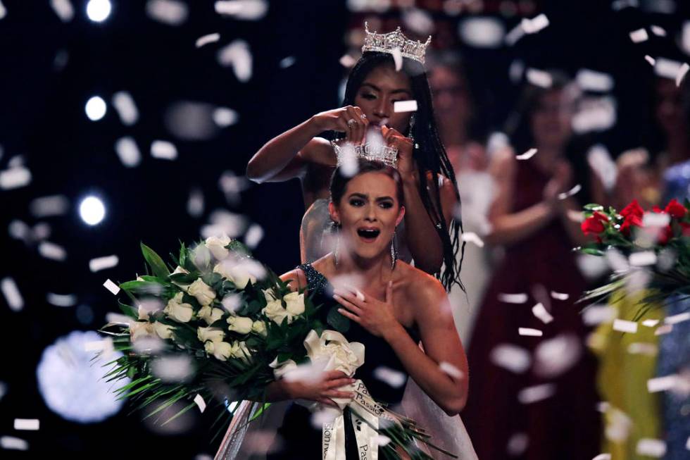 Camille Schrier, of Virginia, reacts as she is crowned after winning the Miss America competiti ...