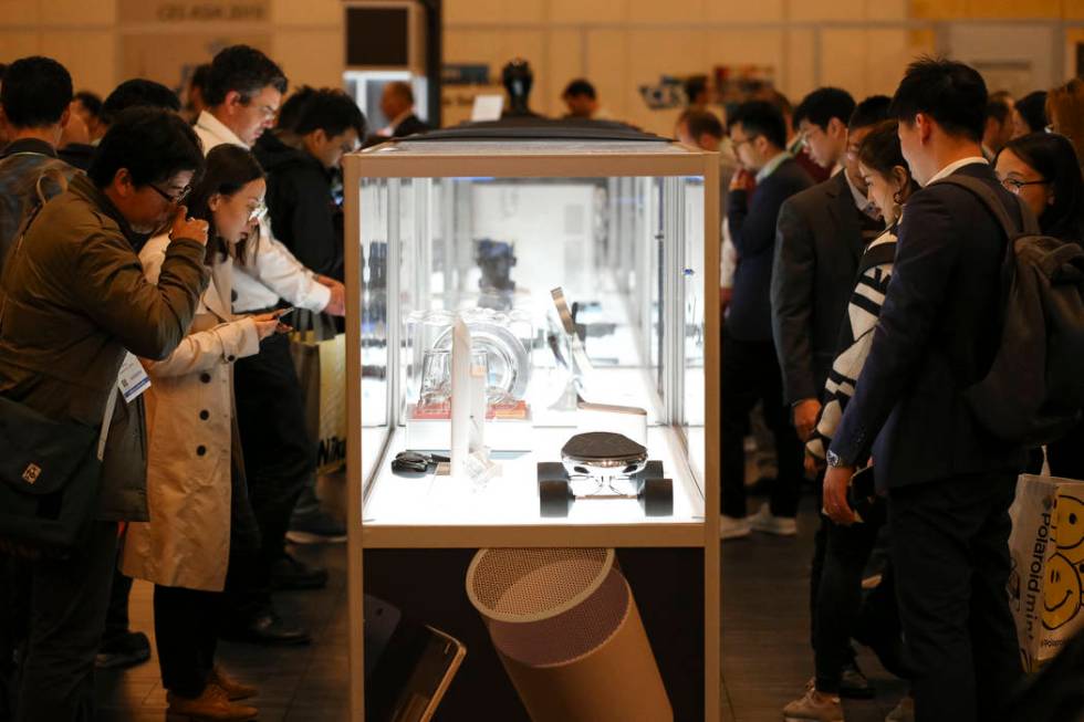 Attendees browse over the Best of Innovation and Honoree products on display at the Innovations ...