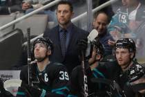 San Jose Sharks interim coach Bob Boughner, center, watches during an NHL hockey game against t ...