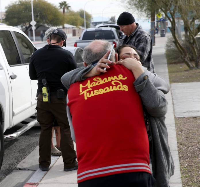 Alpine Motel Apartments resident Kelvin Salyers hugs co-owner Malinda Mier after a fire left 6 ...