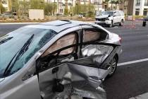 Officers respond to a fatal crash at Buffalo and Peak drives in Las Vegas on Saturday, Dec. 21, ...