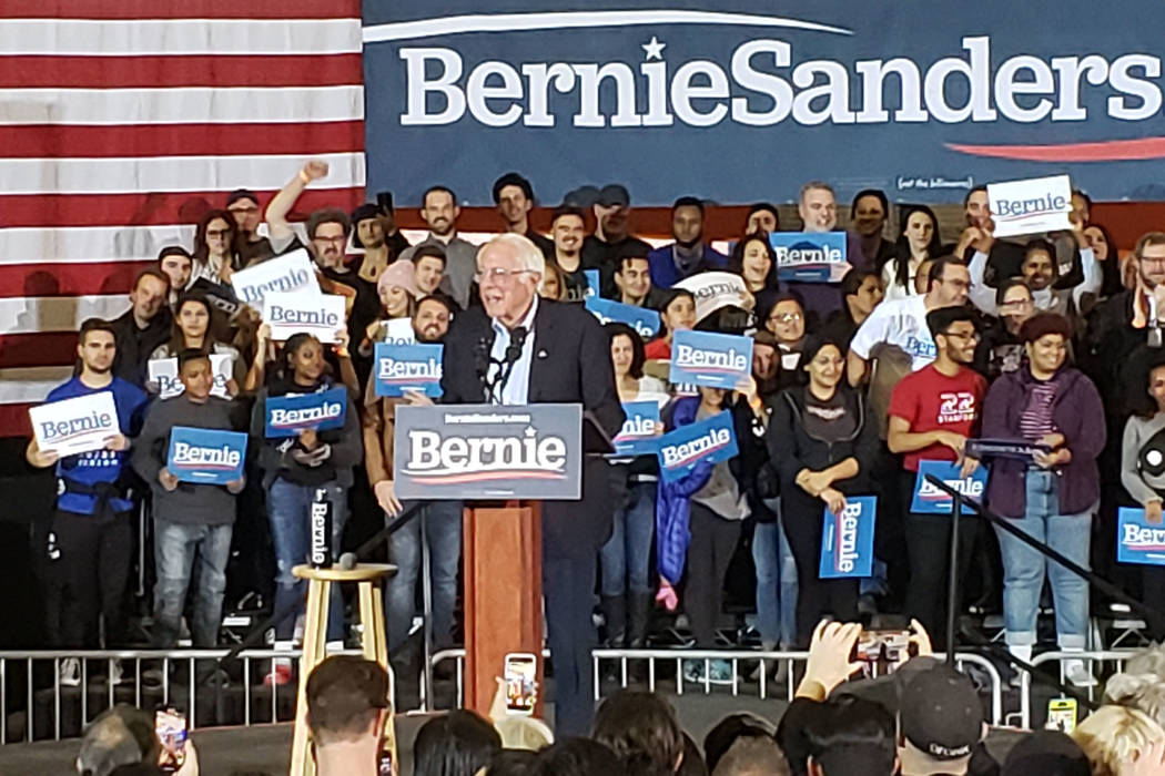 Democratic presidential candidate Sen. Bernie Sanders, I-Vt., center, speaks at a campaign rall ...
