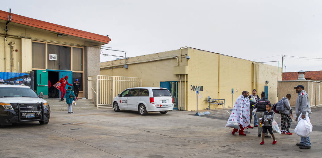 Alpine Motel Apartments residents depart the American Red Cross temporary shelter for fire vict ...