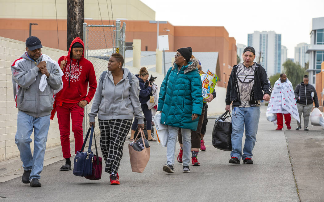 Alpine Motel Apartments residents depart the American Red Cross temporary shelter for fire vict ...