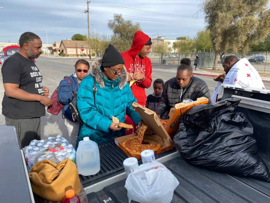 Residents, from left, Markas Combs, Tia Dotson, Stephanie Couch, Timothy Henry, Andru Roach, 7, ...