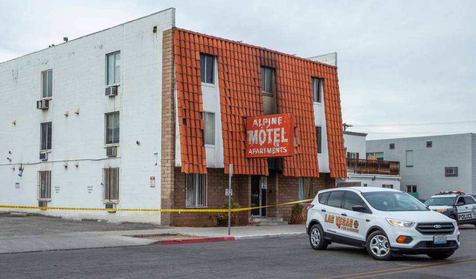 A Las Vegas Fire & Rescue vehicle is parked outside the Alpine Motel Apartments on Sunday, Dec. ...