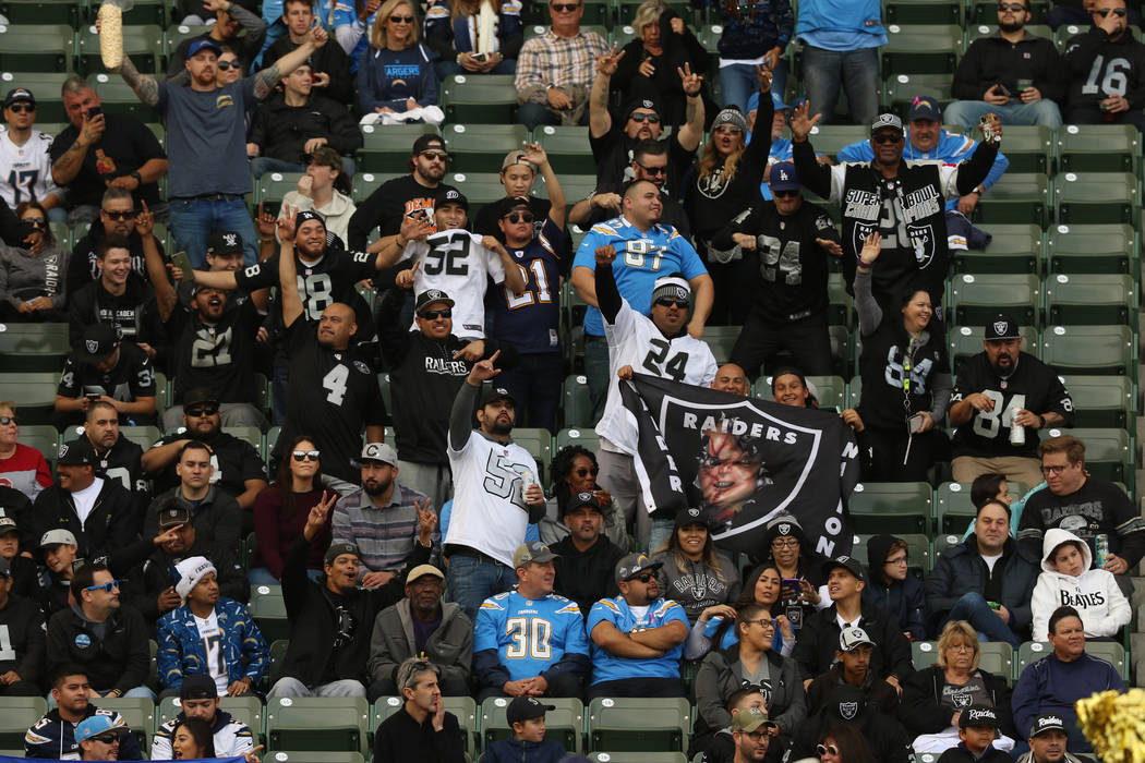 Oakland Raiders fans cheer after Oakland Raiders wide receiver Hunter Renfrow, not pictured, sc ...