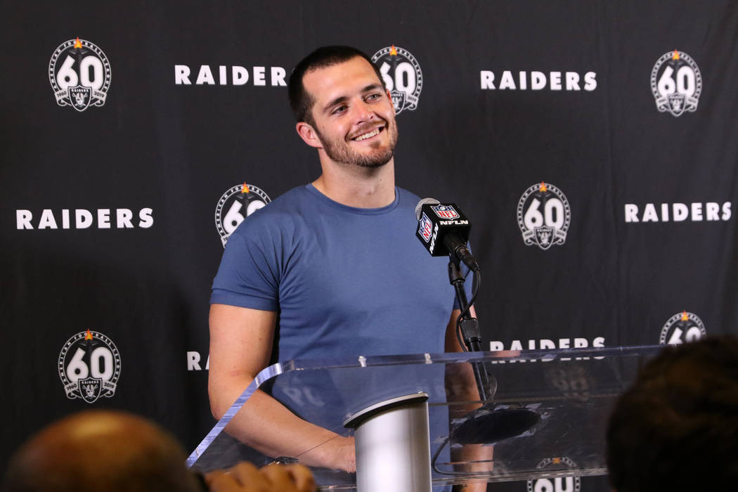 Oakland Raiders quarterback Derek Carr smiles during a postgame press conference after an NFL g ...
