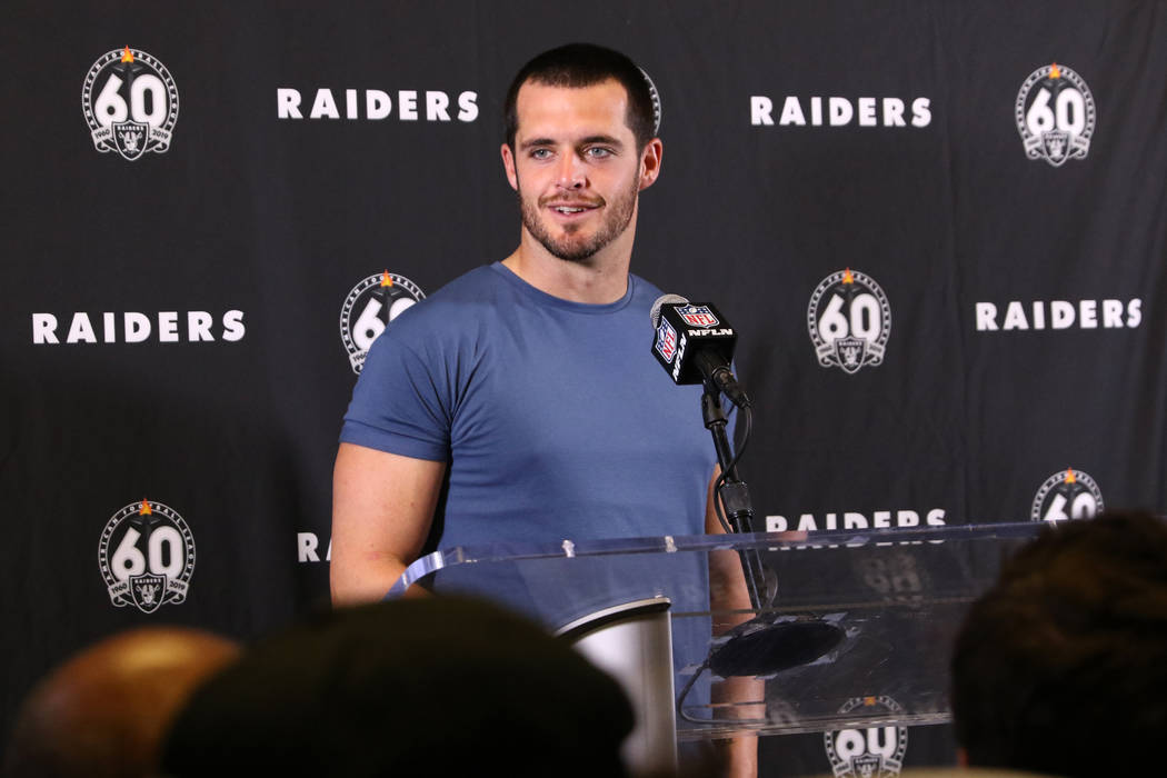 Oakland Raiders quarterback Derek Carr answers questions during a postgame press conference aft ...