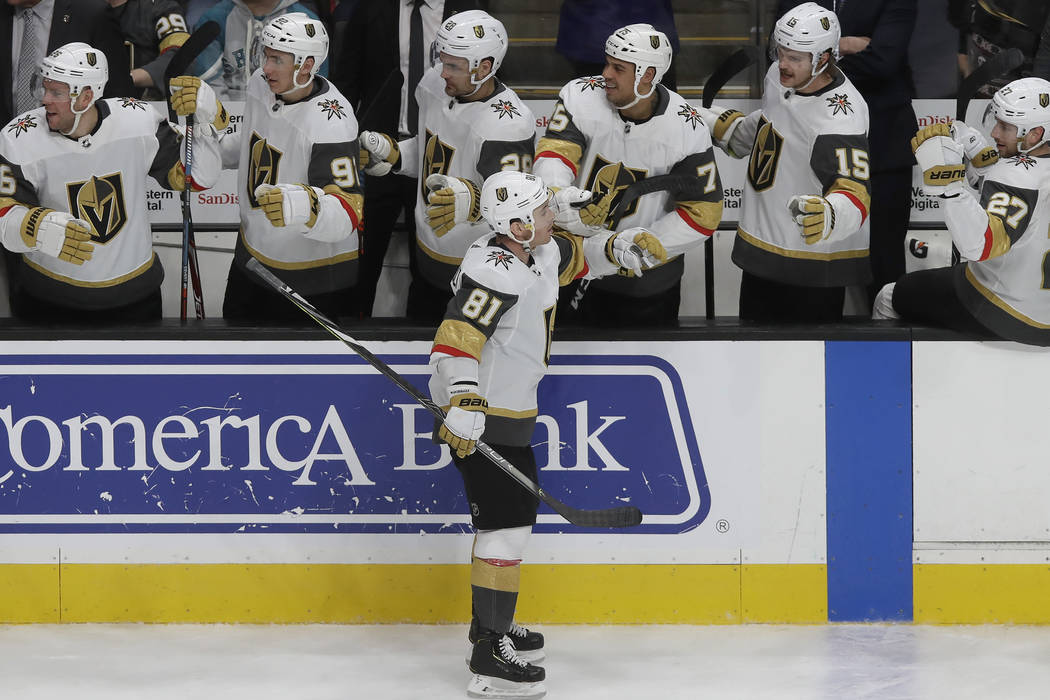 Vegas Golden Knights center Jonathan Marchessault (81) is congratulated by teammates after scor ...