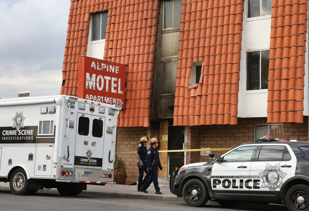 Las Vegas Police Department crime scene investigations truck is parked outside the Alpine Motel ...