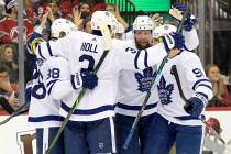 Toronto Maple Leafs' William Nylander (88), Justin Holl (3), Jake Muzzin (8) and John Tavares ( ...