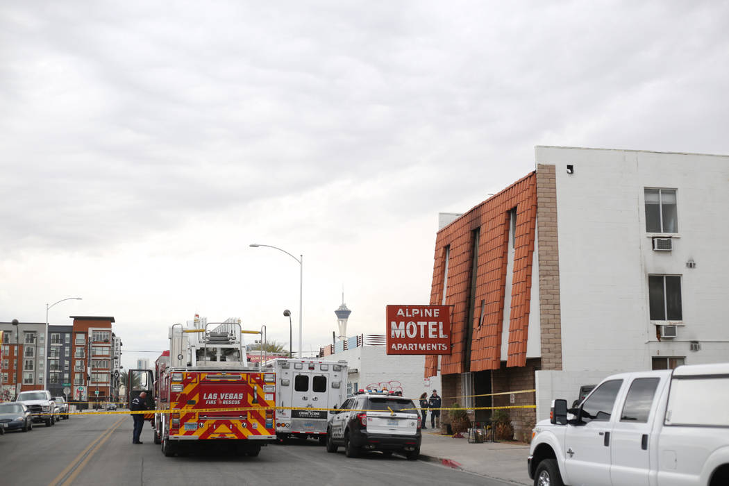 Las Vegas Fire Department investigators with assistance from Las Vegas police investigate the A ...