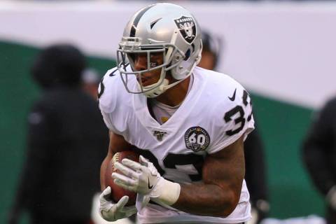 Oakland Raiders running back DeAndre Washington (33) runs with the football during the first ha ...