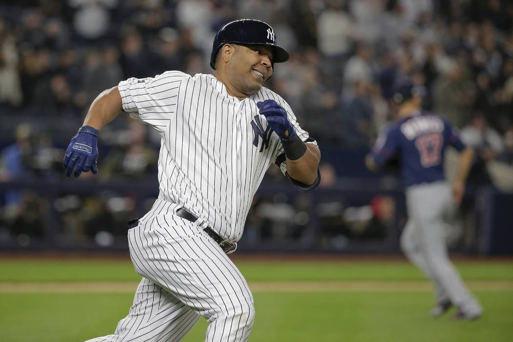 FILE - In this Oct. 4, 2019, file photo, New York Yankees designated hitter Edwin Encarnaci&#xf ...