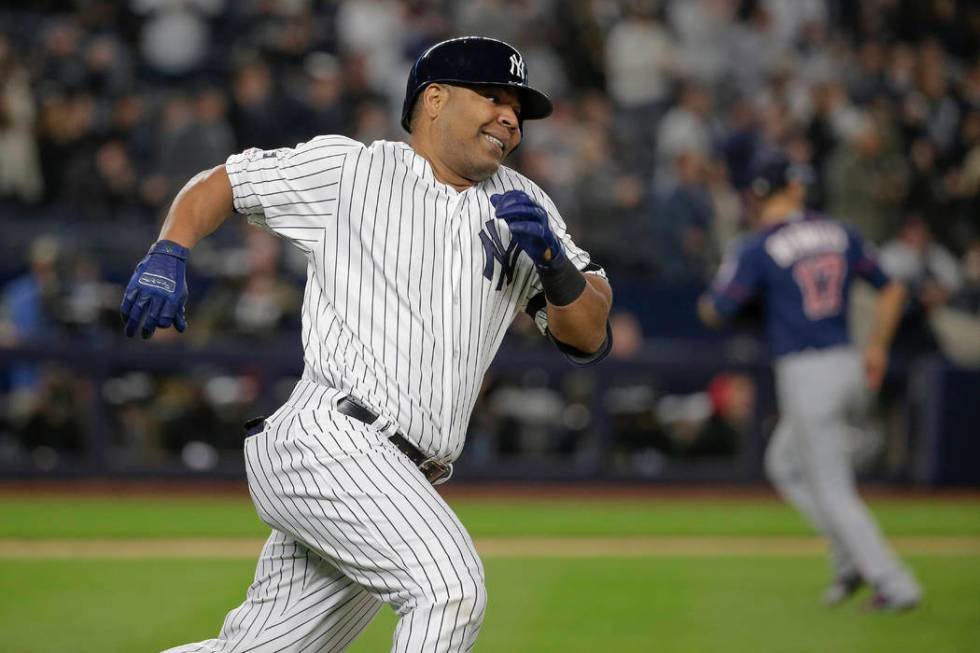 FILE - In this Oct. 4, 2019, file photo, New York Yankees designated hitter Edwin Encarnaci&#xf ...