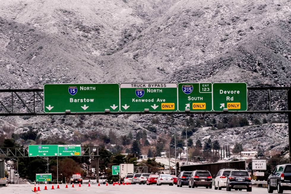 Vehicles are diverted off the northbound 15 Freeway to Kenwood Ave. on-ramp as Cajon Pass is sh ...