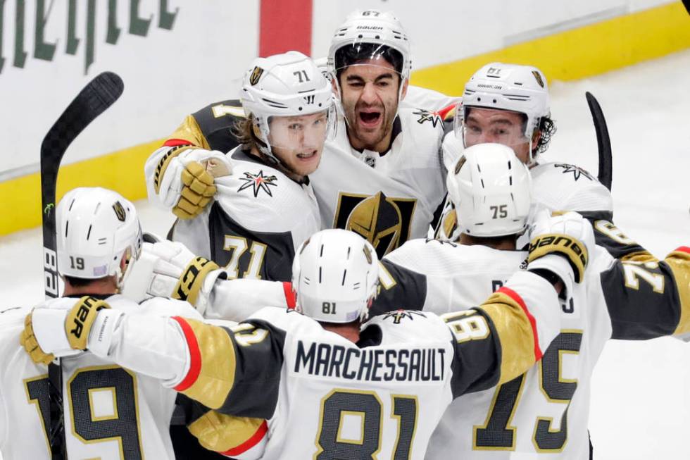 Vegas Golden Knights left wing Max Pacioretty (67), top center, celebrates with teammates after ...