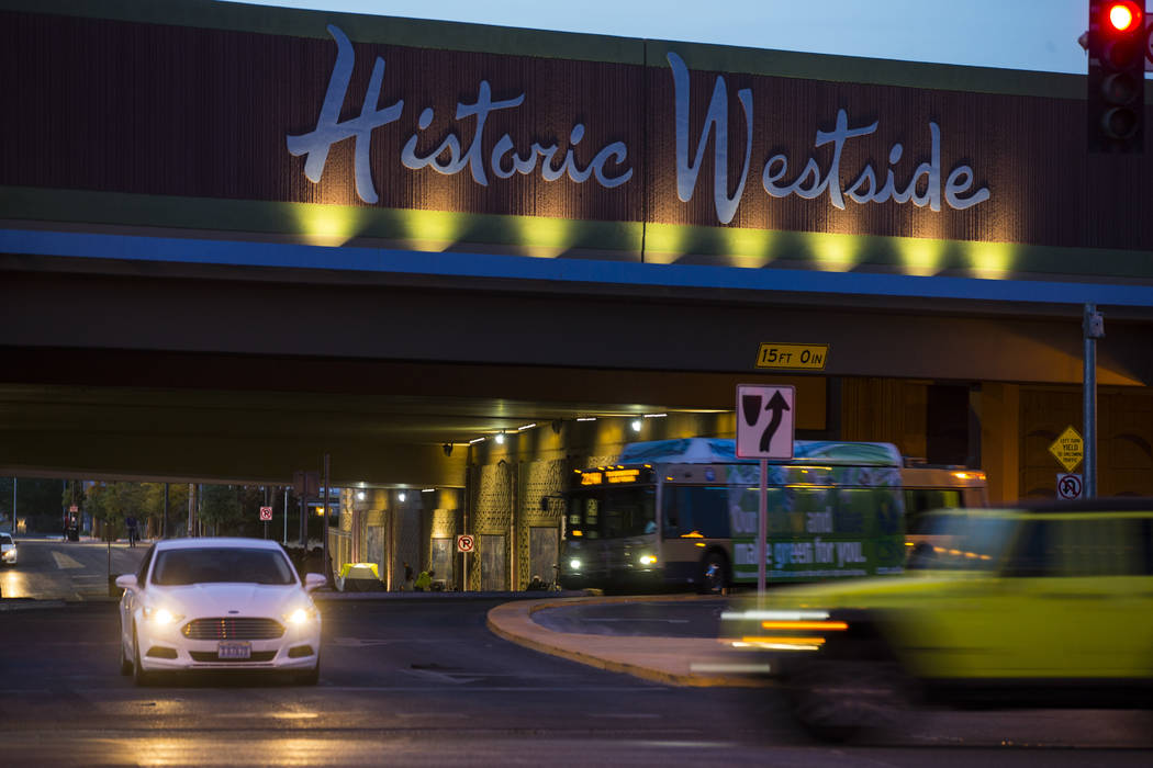 Traffic moves along Bonanza Road past the Historic Westside sign above F Street in Las Vegas on ...