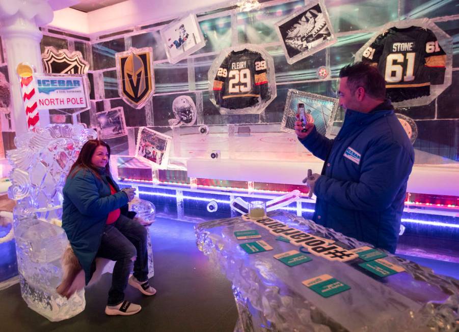 Missy Ruski, left, poses for a photo taken by Can Cekcan, right, at ICEBAR Las Vegas in The Lin ...