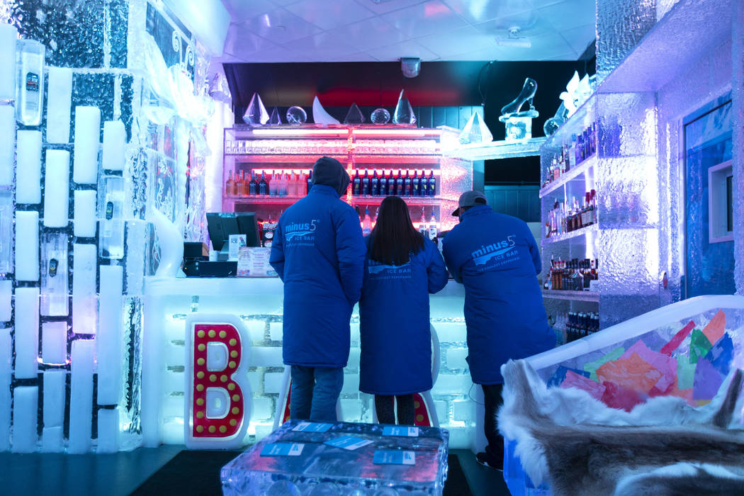 Christian Marquez, left, stands next to his sister-in-law Rebeca Marquez, center, and brother A ...