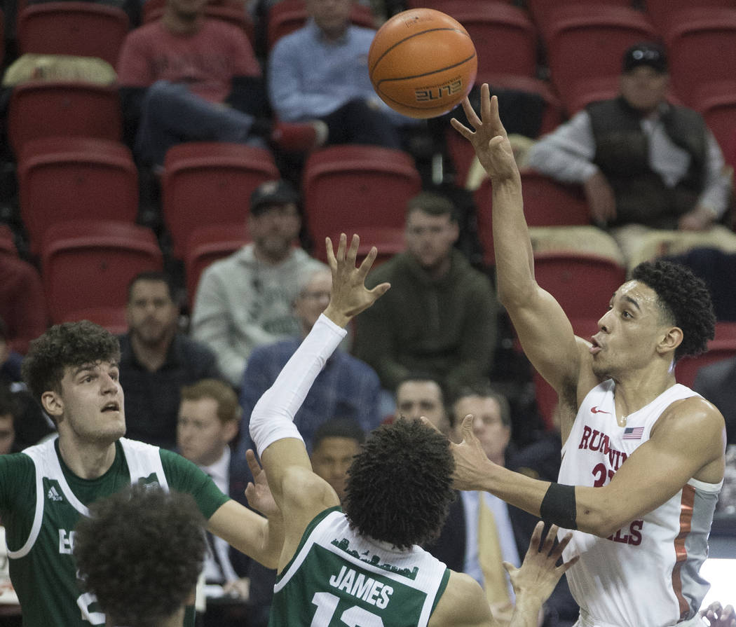 UNLV Rebels guard Marvin Coleman (31) shoots a runner over Eastern Michigan Eagles guard Chris ...