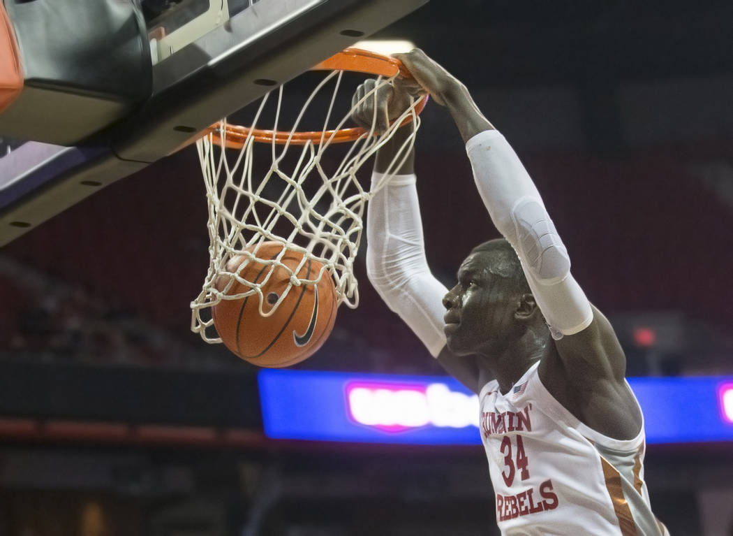 UNLV Rebels forward Cheikh Mbacke Diong (34) dunks in the first half during an NCAA basketball ...