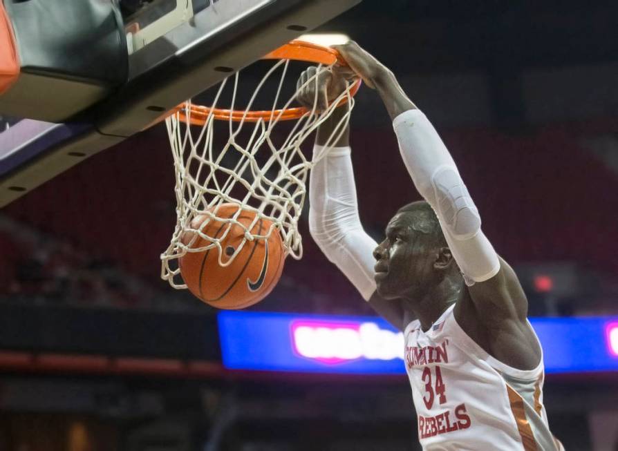 UNLV Rebels forward Cheikh Mbacke Diong (34) dunks in the first half during an NCAA basketball ...