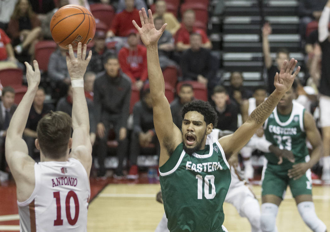 UNLV Rebels guard Jonah Antonio (10) shoots a corner three over Eastern Michigan Eagles guard D ...