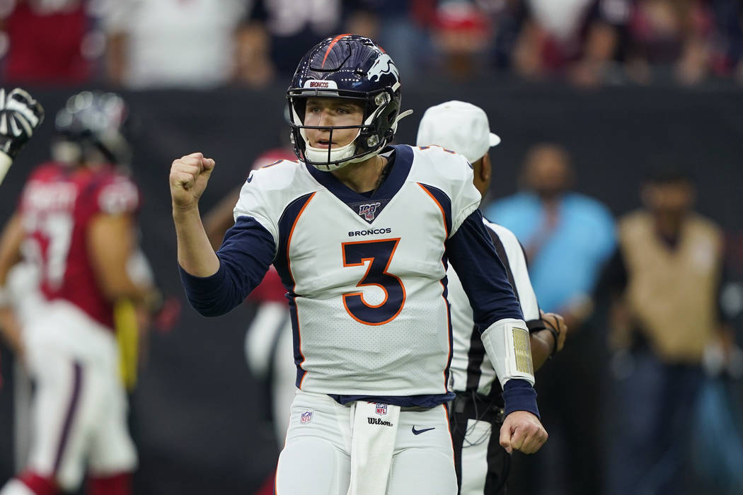 Denver Broncos quarterback Drew Lock (3) celebrates a score against the Houston Texans during t ...