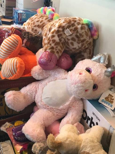 Toys and stuffed animals are pictured Saturday at the Mob Museum that will be donated to victim ...