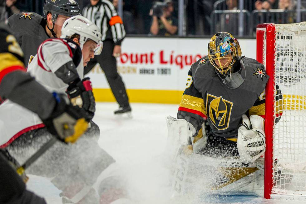 Vegas Golden Knights goaltender Marc-Andre Fleury (29, right) makes another save over the Arizo ...