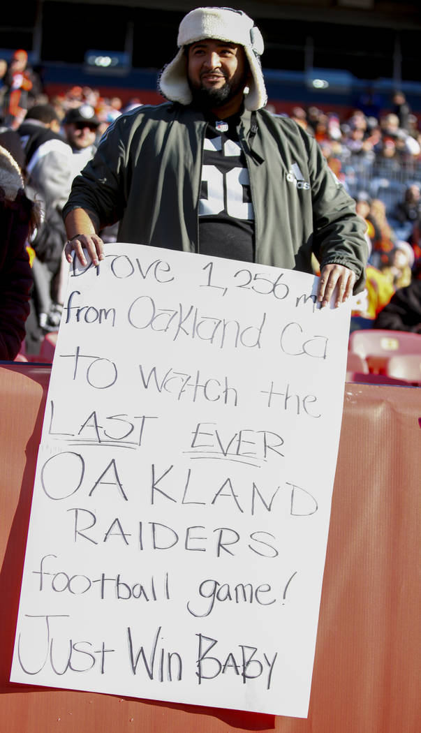 An Oakland Raiders fan prior to an NFL game against the Denver Broncos at Empower Field at Mile ...