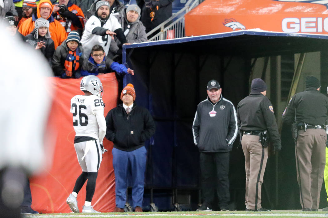 Oakland Raiders cornerback Nevin Lawson (26) leaves the field after being ejected for his invol ...