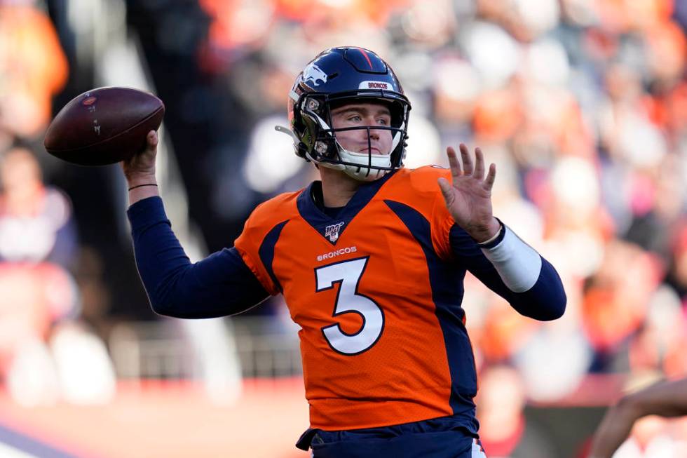 Denver Broncos quarterback Drew Lock throws a pass during the first half of an NFL football gam ...