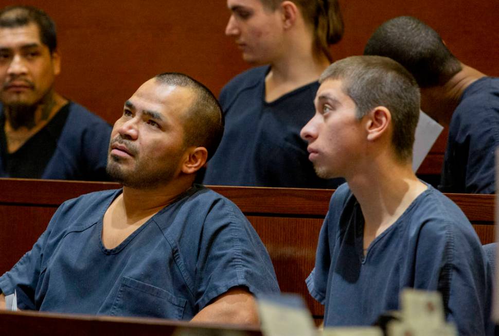 Gerardo Aparicio, 35, left, and Oscar Reyes, 19, both charged for murder, appear at their court ...