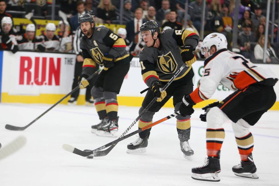 Vegas Golden Knights center Jonathan Marchessault (81) looks for an open play under pressure fr ...