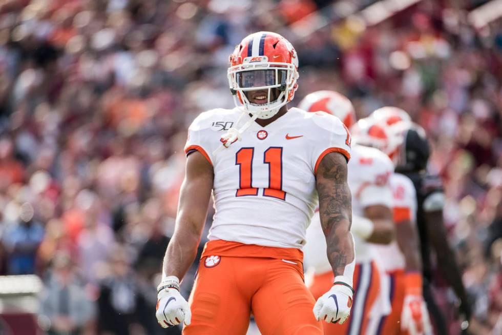 FILE - In this Nov. 30, 2019, file photo, Clemson linebacker Isaiah Simmons (11) celebrates a s ...