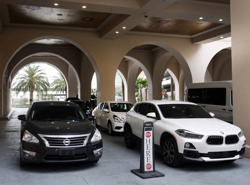 Vehicles are dropped off for the free valet parking at the Sahara Las Vegas on Friday, Dec. 20, ...