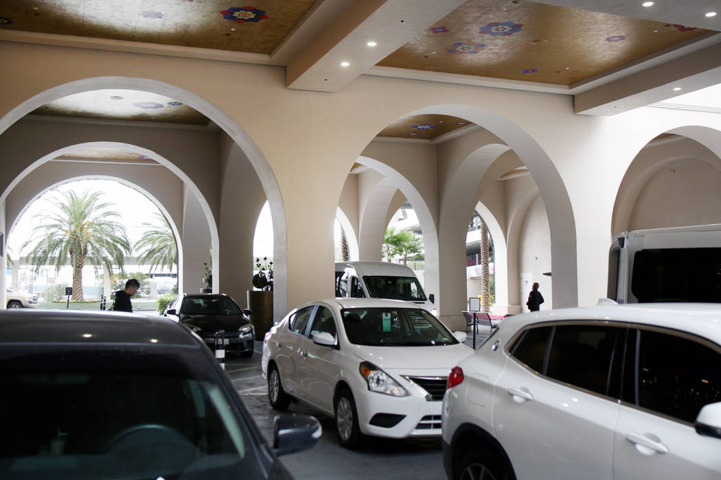 Vehicles are dropped off at the free valet parking at the Sahara Las Vegas on Friday, Dec. 20, ...