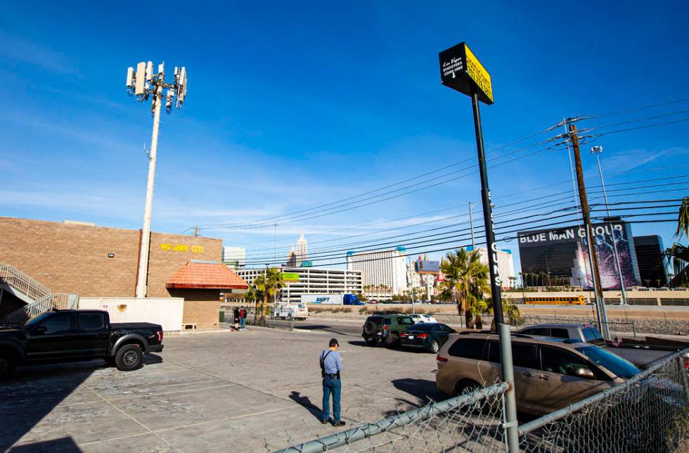 A view of a 5G cell tower, left, on Dean Martin Drive by Ali Baba Lane in Las Vegas on Tuesday, ...