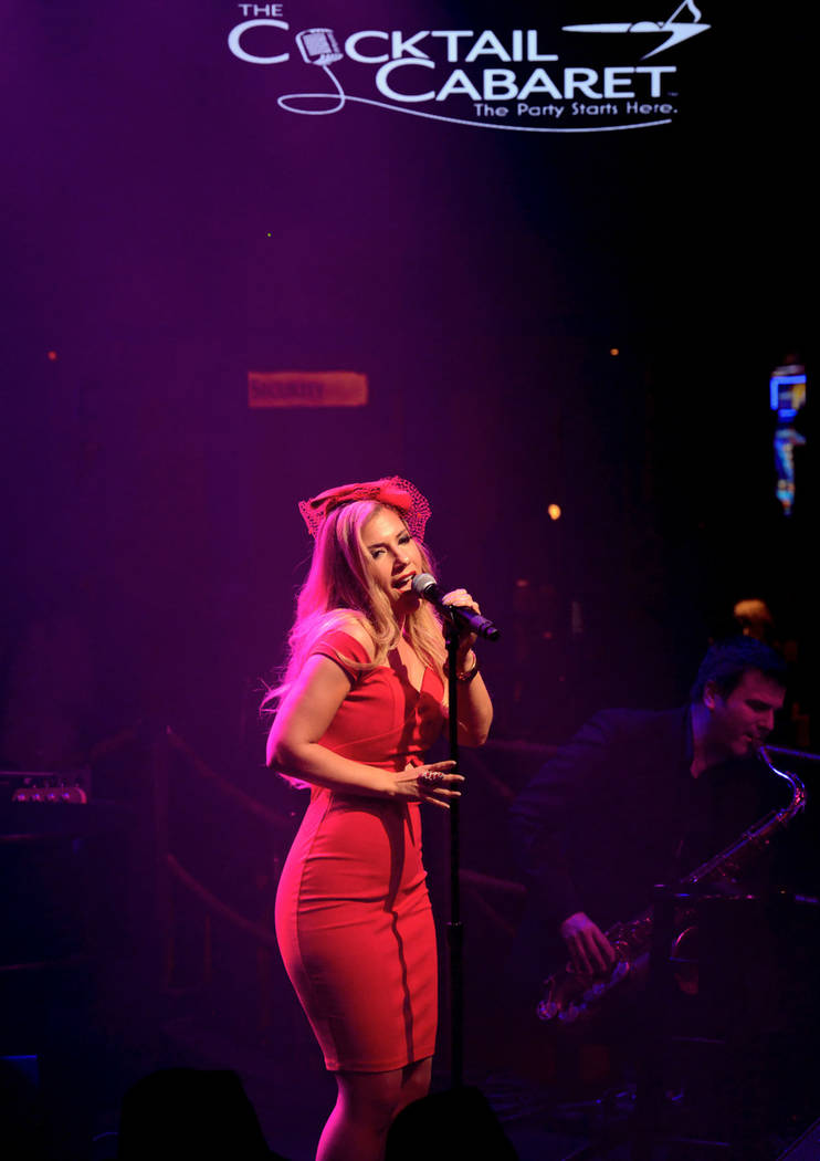 Maren Wade takes center stage during the opening night of the musical review "The Cocktail Caba ...