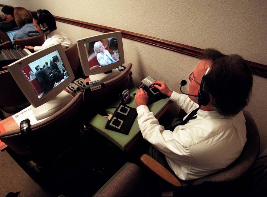 Court TV cameraman Dennis Lynch operates the two remote cameras in the Margaret Rudin murder tr ...