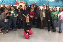 Findlay Automotive Group employees converged on Whitney Elementary School recently to help asse ...