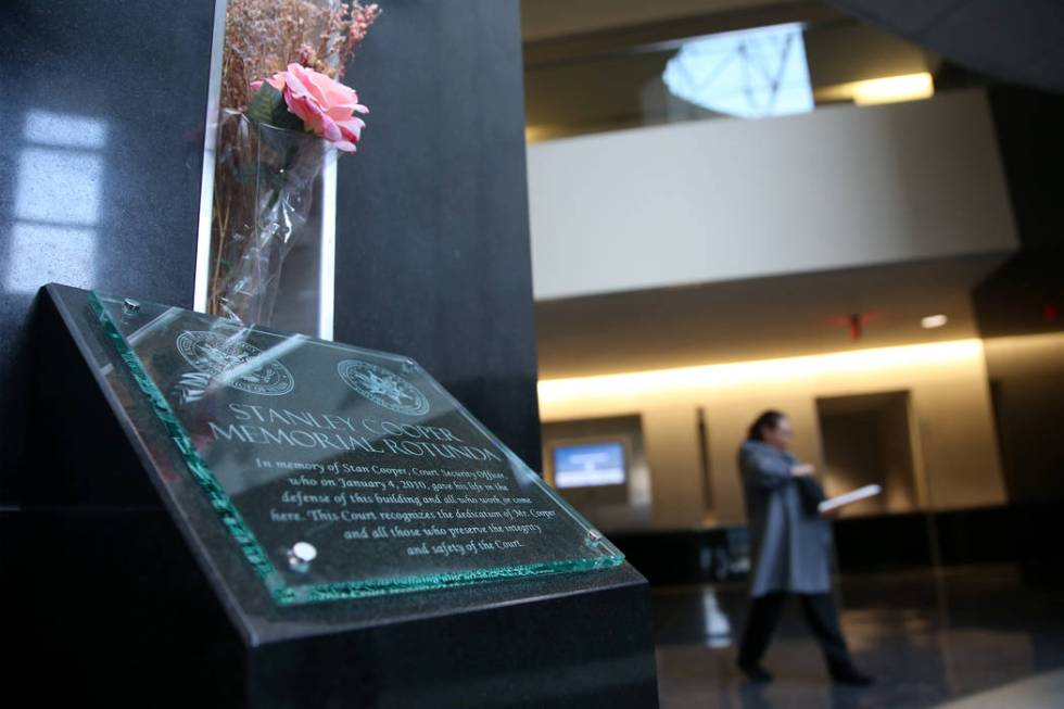 The Stan Cooper memorial plaque inside the Lloyd George U.S. Courthouse in Las Vegas, Friday, J ...