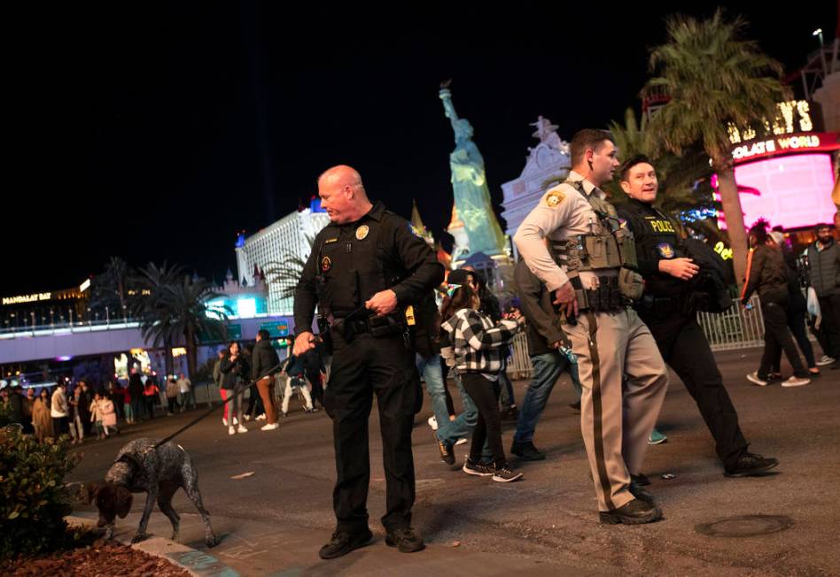 Metropolitan police patrol Las Vegas Boulevard for New Year's Eve on the Strip on Tuesday, Dec. ...
