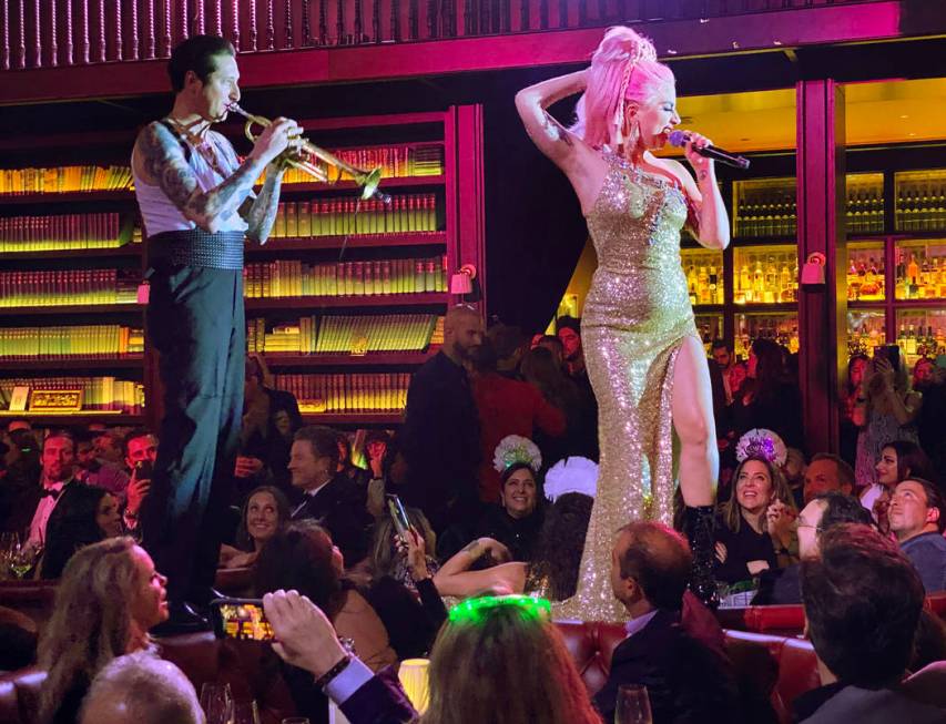 Brian Newman and Lady Gaga, perform at NoMad Restaurant at Park MGM on the Strip on New Year's ...