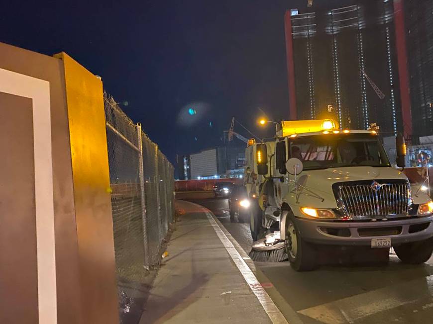 Crews use 26 street sweepers to scour the Las Vegas Strip and nearby streets as quickly as poss ...