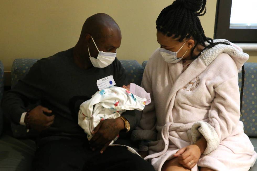 Marquis Johnson Sr. and Latasha Atkinson with their newborn baby Marquis Jr. at Sunrise Childre ...